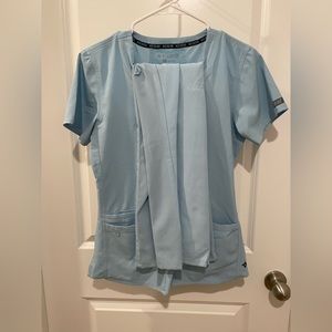 COPY - XS blue scrubs comes with top and bottom. great condition!